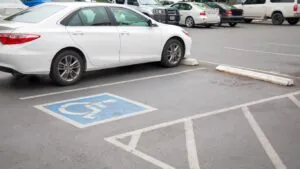 cars parked in a parking lot, parking lot maintenance guide for property owners