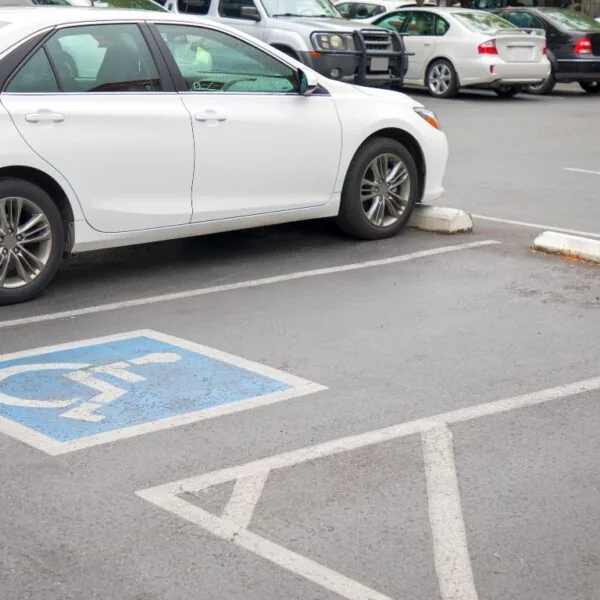 cars parked in a parking lot, parking lot maintenance guide for property owners