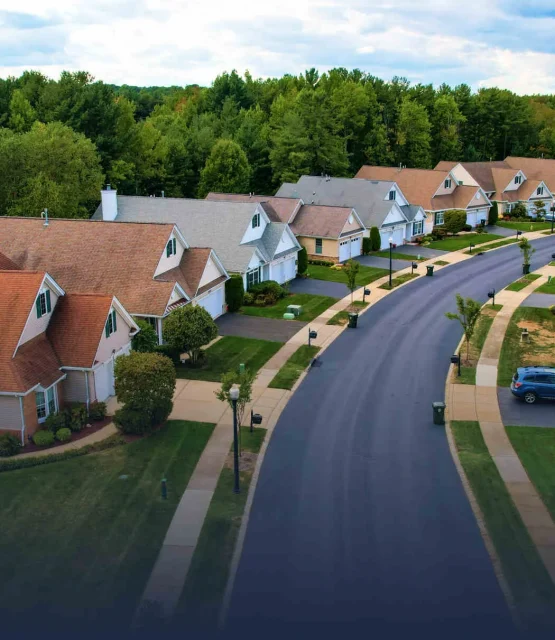 Aerial view of residential road after receiving asphalt paving in cincinnati