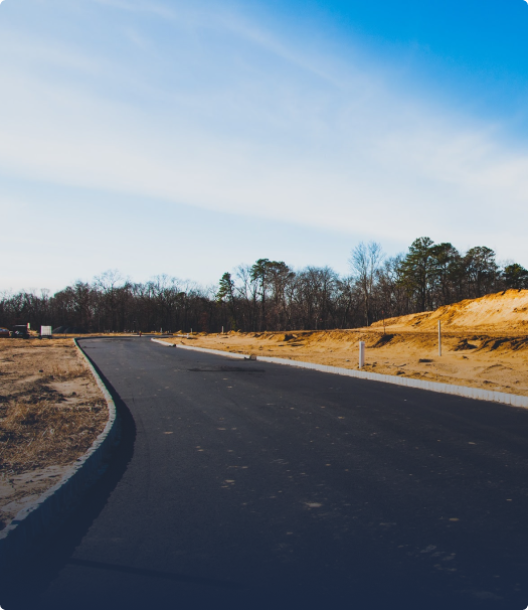 fresh asphalt sealcoating on a roadway in cincinnati