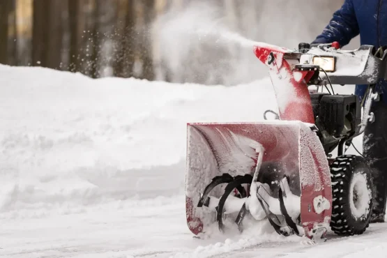 snow blower machine blowing snow in cincinnati